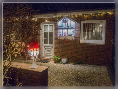 Weihnachtzmtze auf Lampe